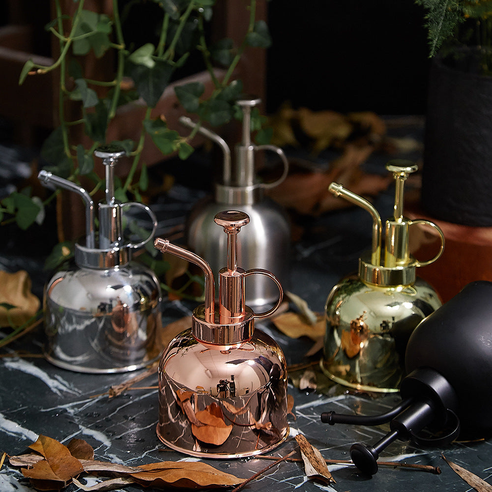 Vintage stainless steel plant misters in gold, copper, silver and black