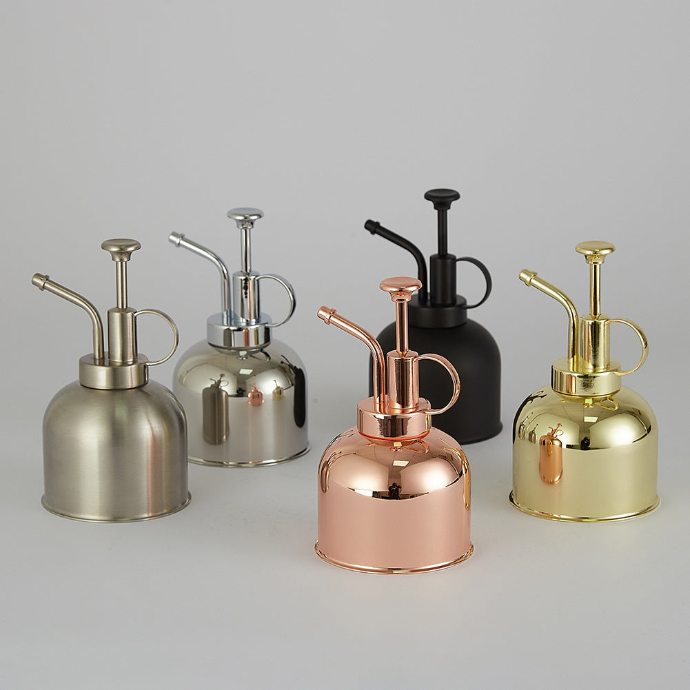 Vintage plant misters in five finishes